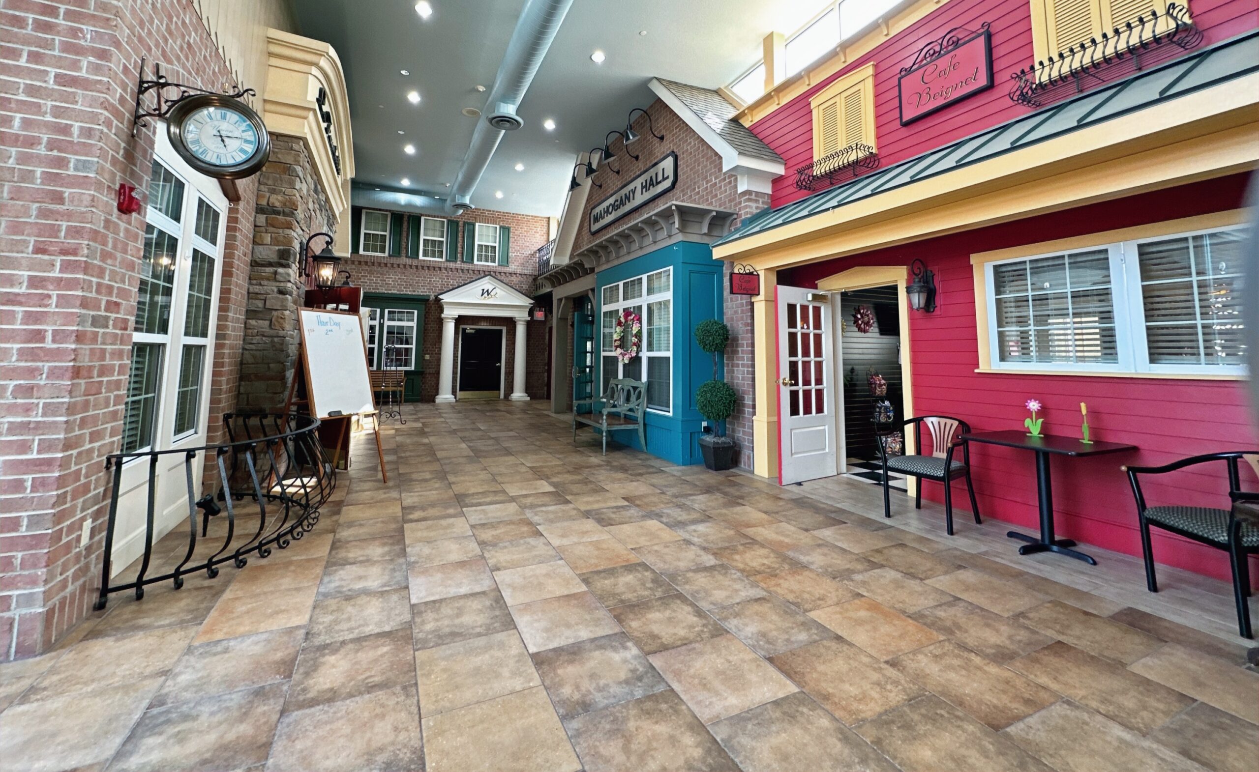 Colorful indoor village courtyard at Woodlands