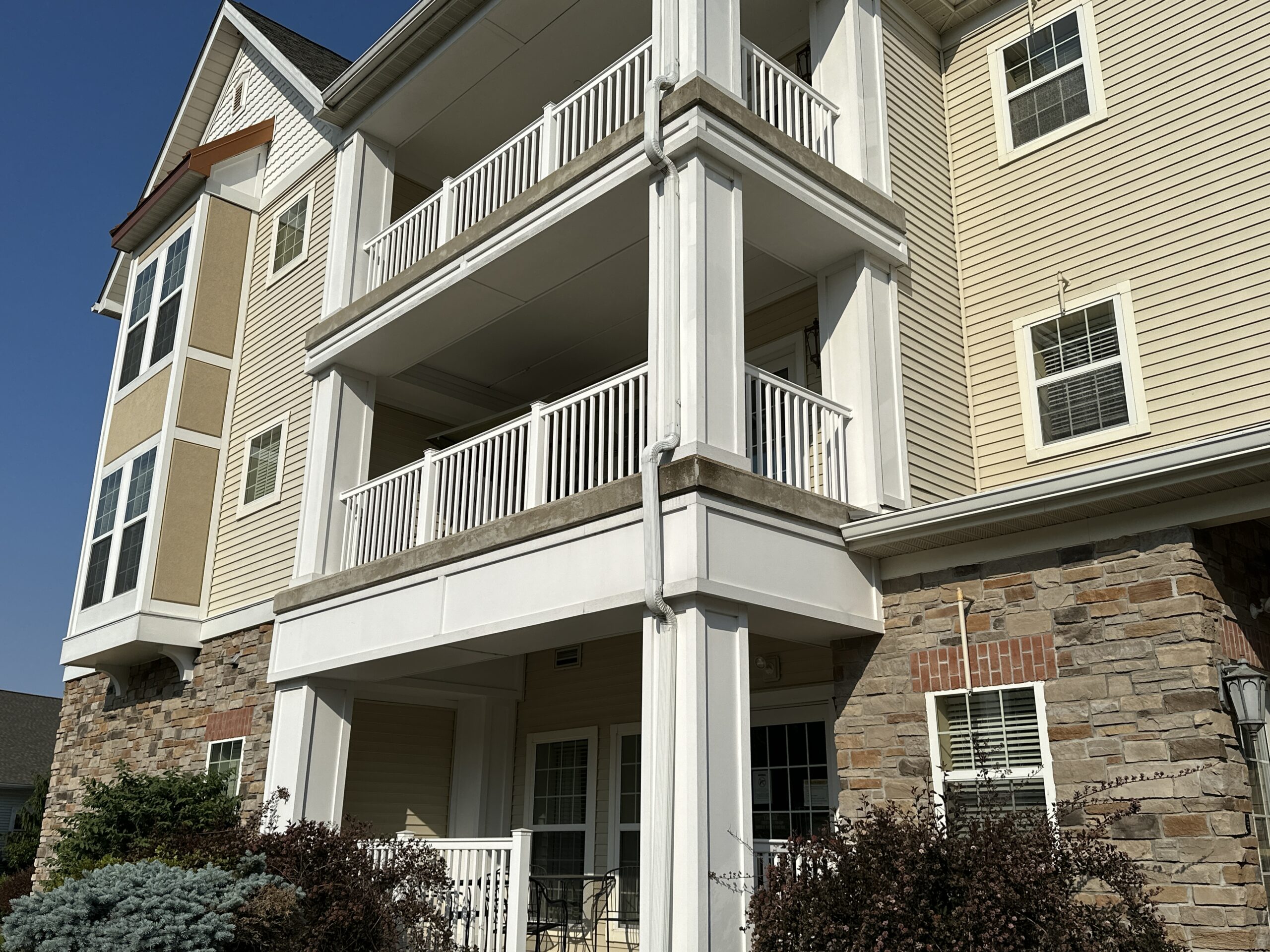 Balcony sitting area at Woodlands Assisted Living